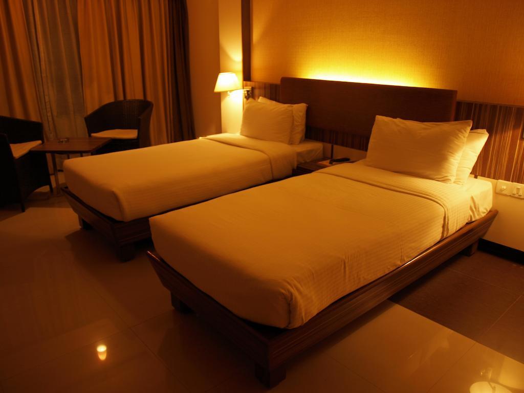 Kapila Business Hotel Pune Værelse billede